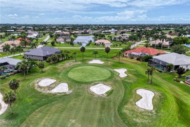 Nestled in the heart of Cape Coral, this extraordinary property on Royal Tee Country Club in Florida - for sale on GolfHomes.com, golf home, golf lot