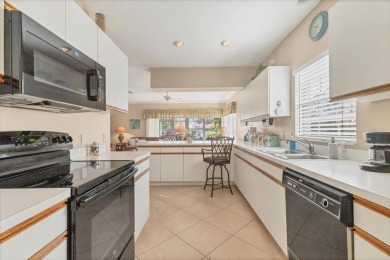 Welcoming Two Bedroom plus Den/Office with French Doors, Two on Waterford Golf Club in Florida - for sale on GolfHomes.com, golf home, golf lot