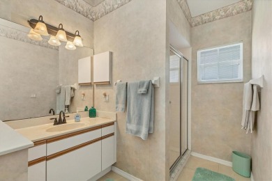 Welcoming Two Bedroom plus Den/Office with French Doors, Two on Waterford Golf Club in Florida - for sale on GolfHomes.com, golf home, golf lot