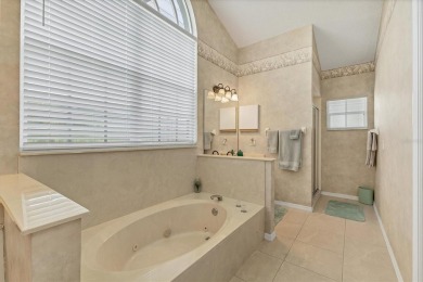 Welcoming Two Bedroom plus Den/Office with French Doors, Two on Waterford Golf Club in Florida - for sale on GolfHomes.com, golf home, golf lot