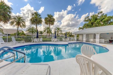 Welcoming Two Bedroom plus Den/Office with French Doors, Two on Waterford Golf Club in Florida - for sale on GolfHomes.com, golf home, golf lot