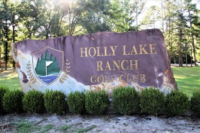 This cabin, located in Holly Lake Ranch, is situated on 2, very on Holly Lake Ranch Golf Club in Texas - for sale on GolfHomes.com, golf home, golf lot