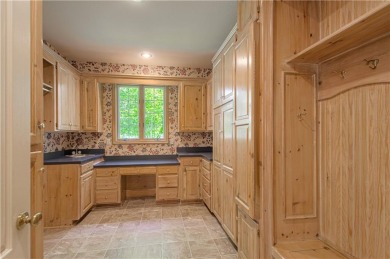 Step into luxury with this stunning custom-built home nestled in on Shadow Glen Golf Club in Kansas - for sale on GolfHomes.com, golf home, golf lot