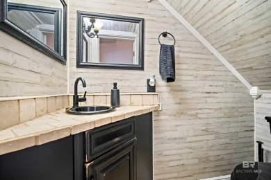 This beautifully designed home in the established Riviere Du on Cypress Country Club and Golf Club  in Alabama - for sale on GolfHomes.com, golf home, golf lot