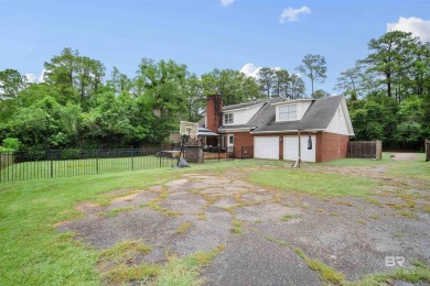 This beautifully designed home in the established Riviere Du on Cypress Country Club and Golf Club  in Alabama - for sale on GolfHomes.com, golf home, golf lot