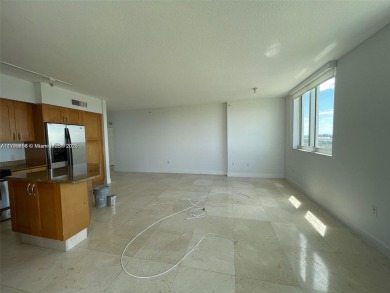 Updated 3-bed, 2-bath corner unit (built in 2007) overlooking on The Diplomat Golf Resort and Spa in Florida - for sale on GolfHomes.com, golf home, golf lot