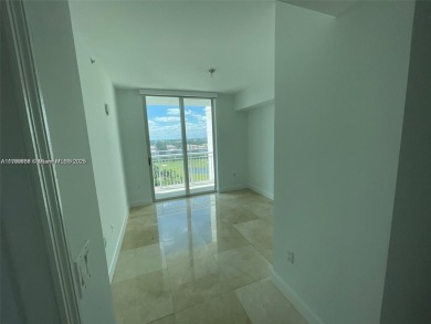 Updated 3-bed, 2-bath corner unit (built in 2007) overlooking on The Diplomat Golf Resort and Spa in Florida - for sale on GolfHomes.com, golf home, golf lot