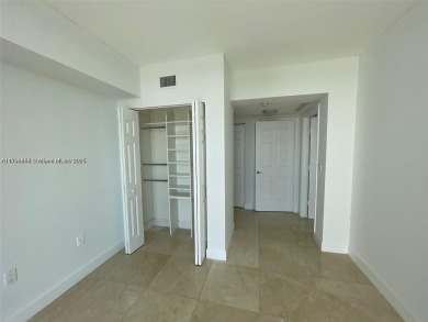 Updated 3-bed, 2-bath corner unit (built in 2007) overlooking on The Diplomat Golf Resort and Spa in Florida - for sale on GolfHomes.com, golf home, golf lot