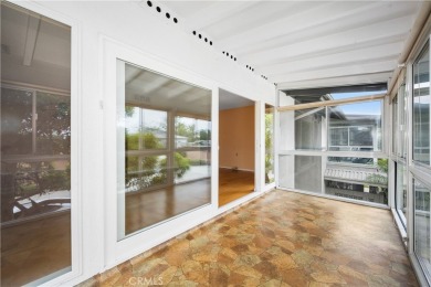 Step into this beautifully reimagined upstairs corner unit in on Leisure World Seal Beach Golf Course in California - for sale on GolfHomes.com, golf home, golf lot