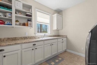 This stunning and spacious four bedroom colonial is located on a on Tanglewood Golf Club in Michigan - for sale on GolfHomes.com, golf home, golf lot