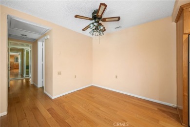 Step into this beautifully reimagined upstairs corner unit in on Leisure World Seal Beach Golf Course in California - for sale on GolfHomes.com, golf home, golf lot