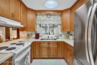 Turnkey Investment Gem - Fully Updated Home with High Rental on Daytona Beach Golf Club in Florida - for sale on GolfHomes.com, golf home, golf lot