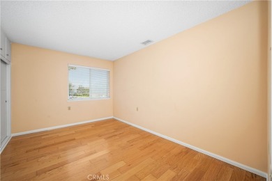 Step into this beautifully reimagined upstairs corner unit in on Leisure World Seal Beach Golf Course in California - for sale on GolfHomes.com, golf home, golf lot