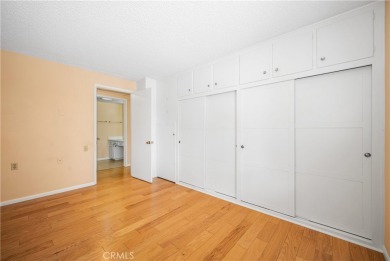 Step into this beautifully reimagined upstairs corner unit in on Leisure World Seal Beach Golf Course in California - for sale on GolfHomes.com, golf home, golf lot