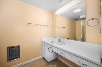Step into this beautifully reimagined upstairs corner unit in on Leisure World Seal Beach Golf Course in California - for sale on GolfHomes.com, golf home, golf lot