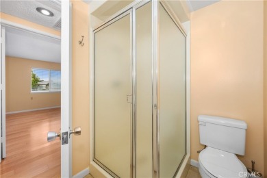 Step into this beautifully reimagined upstairs corner unit in on Leisure World Seal Beach Golf Course in California - for sale on GolfHomes.com, golf home, golf lot
