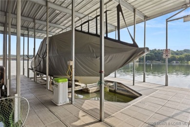 Complete package with this stylish 3-bed, 2-bath loft condo at on Lake Valley Country Club in Missouri - for sale on GolfHomes.com, golf home, golf lot