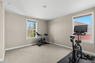 This stunning and spacious four bedroom colonial is located on a on Tanglewood Golf Club in Michigan - for sale on GolfHomes.com, golf home, golf lot