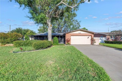 This well maintained concrete block corner home sustained flood on Mangrove Bay Golf Course in Florida - for sale on GolfHomes.com, golf home, golf lot