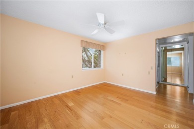 Step into this beautifully reimagined upstairs corner unit in on Leisure World Seal Beach Golf Course in California - for sale on GolfHomes.com, golf home, golf lot