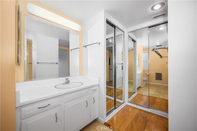 Step into this beautifully reimagined upstairs corner unit in on Leisure World Seal Beach Golf Course in California - for sale on GolfHomes.com, golf home, golf lot