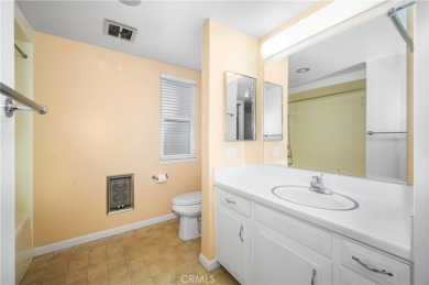 Step into this beautifully reimagined upstairs corner unit in on Leisure World Seal Beach Golf Course in California - for sale on GolfHomes.com, golf home, golf lot