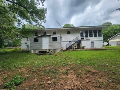 Great location. Great opportunity. This 2-bed, 2-bath home comes on Cherokee Village North Course in Arkansas - for sale on GolfHomes.com, golf home, golf lot