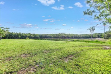 This well maintained concrete block corner home sustained flood on Mangrove Bay Golf Course in Florida - for sale on GolfHomes.com, golf home, golf lot