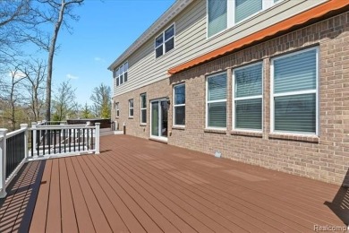 This stunning and spacious four bedroom colonial is located on a on Tanglewood Golf Club in Michigan - for sale on GolfHomes.com, golf home, golf lot