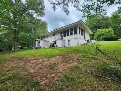 Great location. Great opportunity. This 2-bed, 2-bath home comes on Cherokee Village North Course in Arkansas - for sale on GolfHomes.com, golf home, golf lot