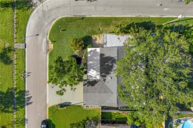 This well maintained concrete block corner home sustained flood on Mangrove Bay Golf Course in Florida - for sale on GolfHomes.com, golf home, golf lot