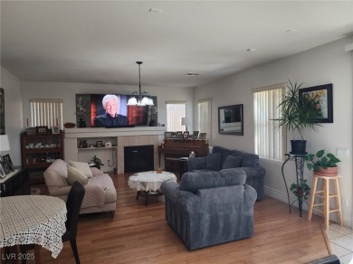 Step into this 2,891 sq ft residence, ideally located on a quiet on Rhodes Ranch Golf Club in Nevada - for sale on GolfHomes.com, golf home, golf lot