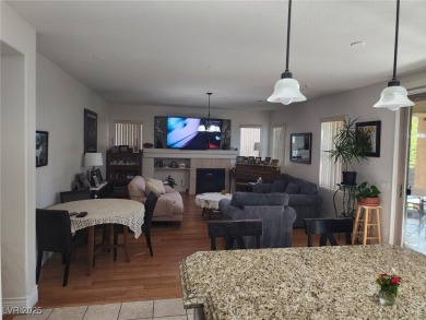 Step into this 2,891 sq ft residence, ideally located on a quiet on Rhodes Ranch Golf Club in Nevada - for sale on GolfHomes.com, golf home, golf lot