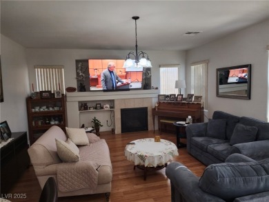 Step into this 2,891 sq ft residence, ideally located on a quiet on Rhodes Ranch Golf Club in Nevada - for sale on GolfHomes.com, golf home, golf lot