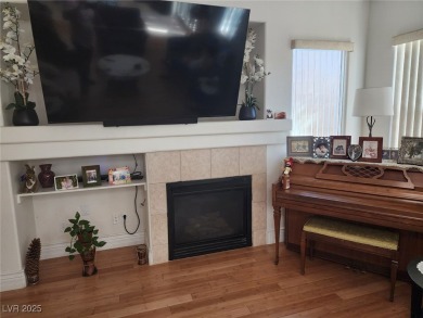 Step into this 2,891 sq ft residence, ideally located on a quiet on Rhodes Ranch Golf Club in Nevada - for sale on GolfHomes.com, golf home, golf lot