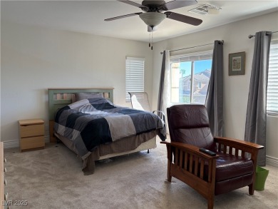 Step into this 2,891 sq ft residence, ideally located on a quiet on Rhodes Ranch Golf Club in Nevada - for sale on GolfHomes.com, golf home, golf lot