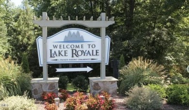 Private & wooded building lot on a quiet street of custom homes on River Golf and County Club at Lake Royale in North Carolina - for sale on GolfHomes.com, golf home, golf lot