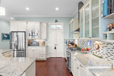 Intracoastal Waterway front luxury home with private dock on Lockwood Folly Country Club in North Carolina - for sale on GolfHomes.com, golf home, golf lot