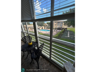 This 1Bed, 1Bath condo has an updated kitchen with granite on Sunrise Lakes Phase III in Florida - for sale on GolfHomes.com, golf home, golf lot