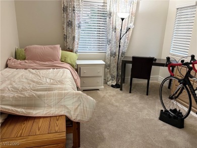 Step into this 2,891 sq ft residence, ideally located on a quiet on Rhodes Ranch Golf Club in Nevada - for sale on GolfHomes.com, golf home, golf lot