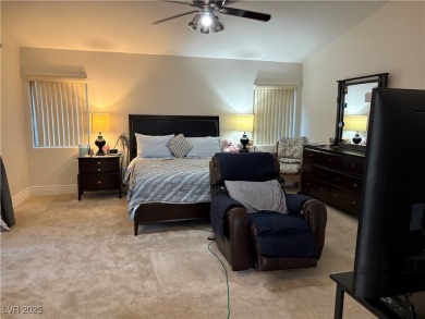 Step into this 2,891 sq ft residence, ideally located on a quiet on Rhodes Ranch Golf Club in Nevada - for sale on GolfHomes.com, golf home, golf lot