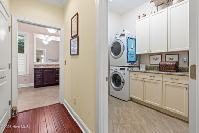 Intracoastal Waterway front luxury home with private dock on Lockwood Folly Country Club in North Carolina - for sale on GolfHomes.com, golf home, golf lot