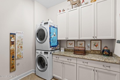 Intracoastal Waterway front luxury home with private dock on Lockwood Folly Country Club in North Carolina - for sale on GolfHomes.com, golf home, golf lot