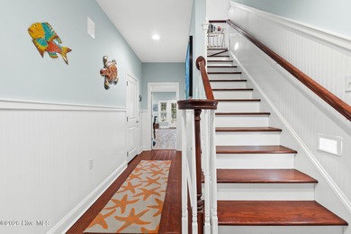 Intracoastal Waterway front luxury home with private dock on Lockwood Folly Country Club in North Carolina - for sale on GolfHomes.com, golf home, golf lot