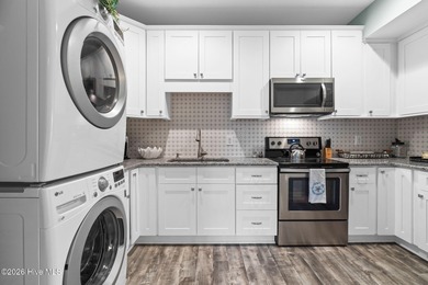 Intracoastal Waterway front luxury home with private dock on Lockwood Folly Country Club in North Carolina - for sale on GolfHomes.com, golf home, golf lot