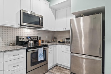 Intracoastal Waterway front luxury home with private dock on Lockwood Folly Country Club in North Carolina - for sale on GolfHomes.com, golf home, golf lot