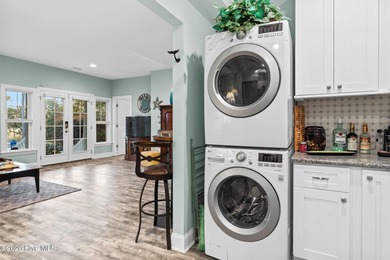 Intracoastal Waterway front luxury home with private dock on Lockwood Folly Country Club in North Carolina - for sale on GolfHomes.com, golf home, golf lot