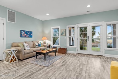 Intracoastal Waterway front luxury home with private dock on Lockwood Folly Country Club in North Carolina - for sale on GolfHomes.com, golf home, golf lot