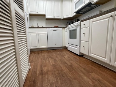 Amazing 2/1.5 55+ WATERFRONT Completely Furnished condo.  The on Country Club At Silver Springs Shores in Florida - for sale on GolfHomes.com, golf home, golf lot