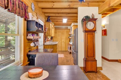 This beautifully maintained log home offers charm, character on Lake Mohawk Golf Club in Ohio - for sale on GolfHomes.com, golf home, golf lot
